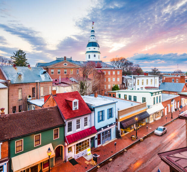 Main Street Annapolis at dusk, lined with colorful historic storefronts